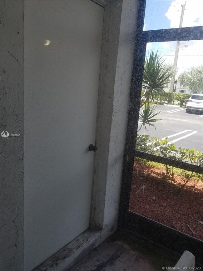 Building Photo - 10724 Royal Palm Blvd