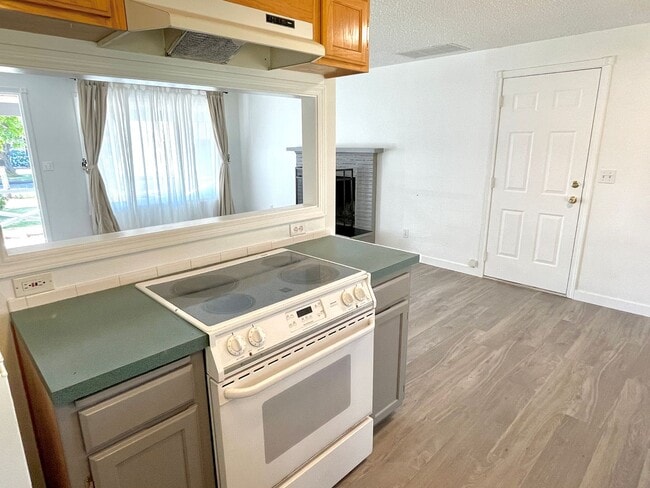 Building Photo - Centennial Remodeled Ranch Home with Large, Fenced Backyard, Attached Garage, Laminate Hardwoods