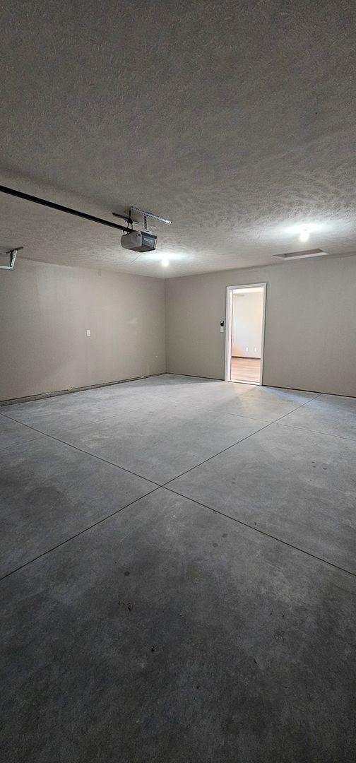 Building Photo - 2-bedroom, 1 bathroom apartment with 1 car detached garage