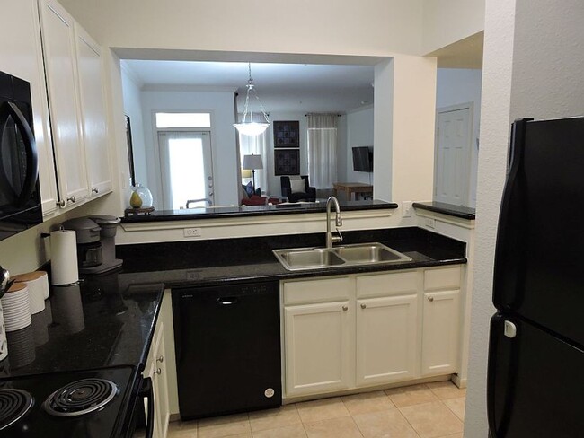 Building Photo - FURNISHED OR UNFURNISHED 3BR/2BA CONDO IN ...