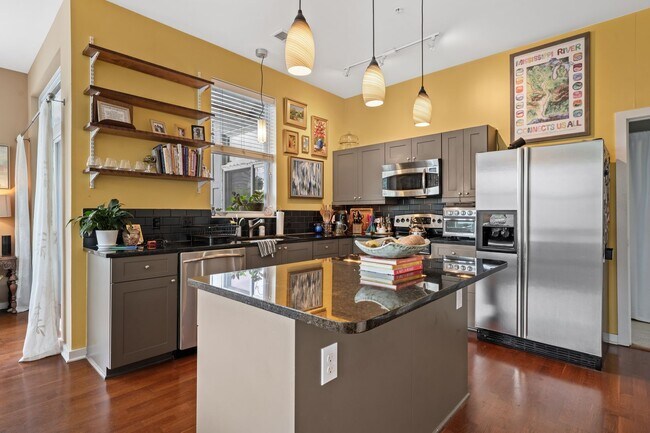 Building Photo - Price Reduced! Downtown Durham 1bd/1ba Corner-Unit Condo with On-Site Personal 1-Car Garage!