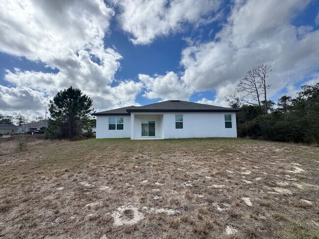 Building Photo - Spacious 4-Bedroom Home in Poinciana – Internet Included & No HOA Approval Required