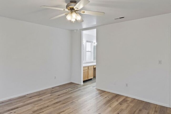 Building Photo - Wonderful 3 Bedroom Home with New Flooring and Paint