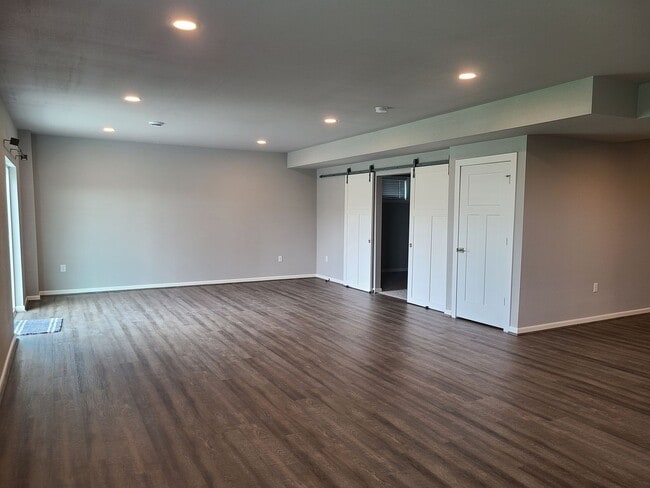 Building Photo - Four Bedroom Three Bath Single Family Home