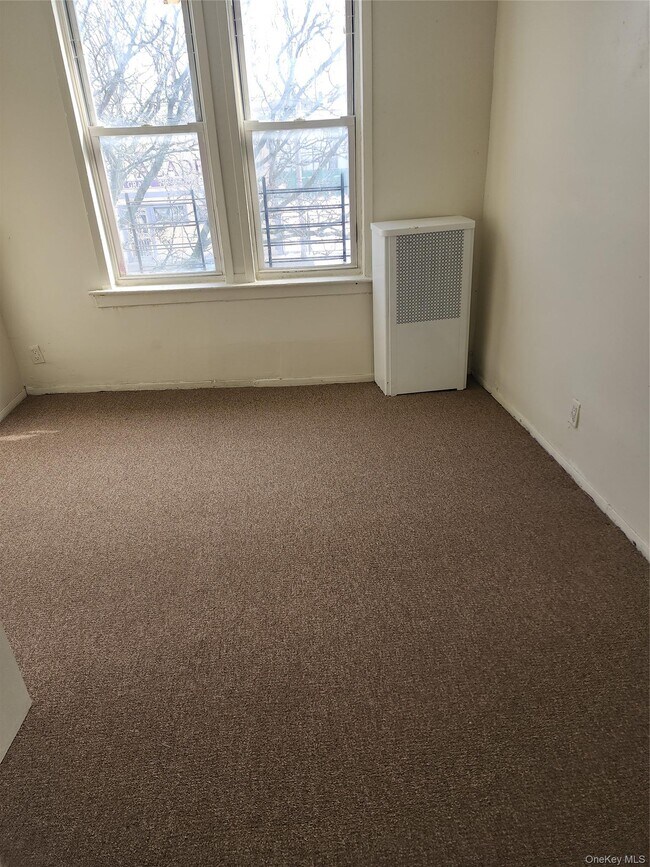 Building Photo - 205-11 Hollis Ave