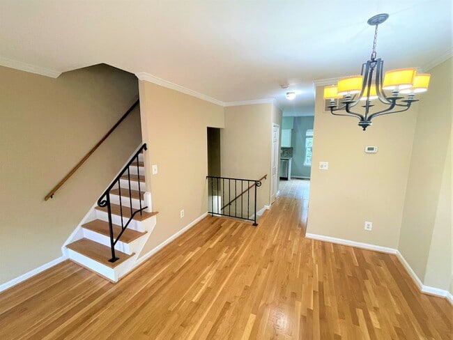 Building Photo - Updated, all brick 3 level townhouse pet friendly townhouse for rent!