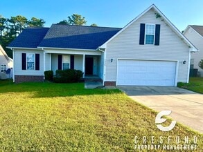 Building Photo - COZY AND CONVENIENT MINUTES FROM FT. BRAGG!