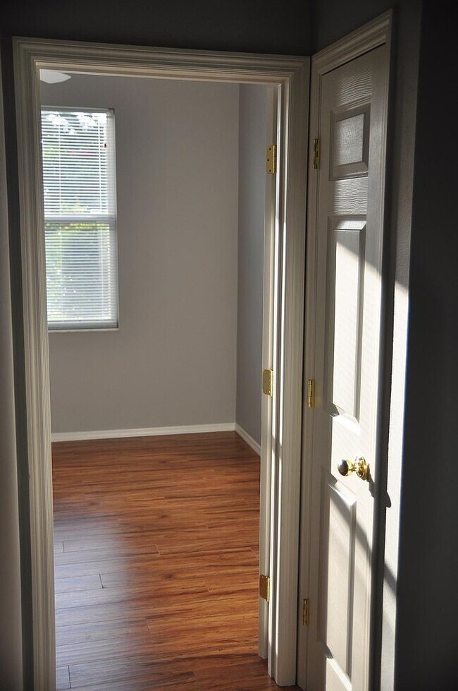 2nd Bedroom of moderate size. Good closet space. Linen closet shown on right. - 5009 46th St W
