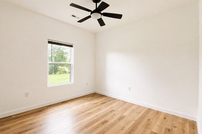 Building Photo - 3-Bedroom Home on Over Half an Acre with Pond Views Near I-40