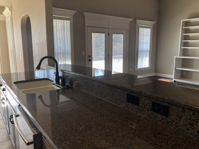 Building Photo - 4BR / 3Car garage / Fully fenced in backyard - Stunning property