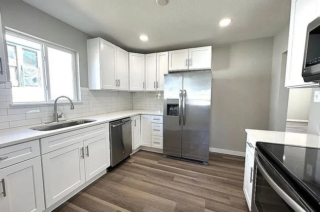 Building Photo - Modern Pet-Friendly Home with Fenced Yard in Central Pueblo!