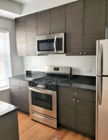 Building Photo - 1640 W Pratt Blvd