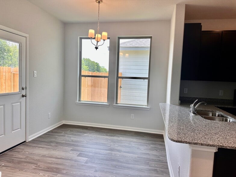 The eat in kitchen is perfect for making meals a family affair! - 730 Tejas Village Pky