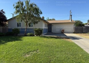 Building Photo - 4 bedroom/ 1 bathroom near schools, park, ...
