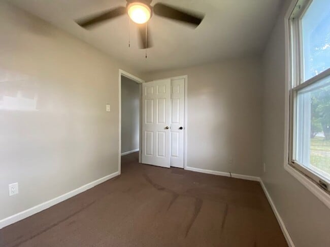 Building Photo - Welcome to this charming three bedroom, on...