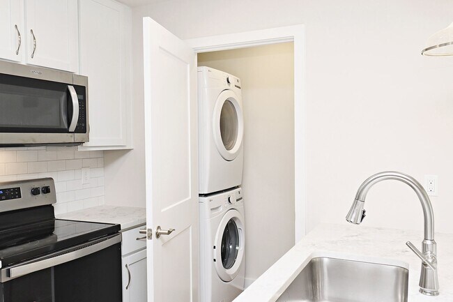 Building Photo - $1,000 Off 1st Month's Rent! Dog-Friendly End-Unit Apartment
