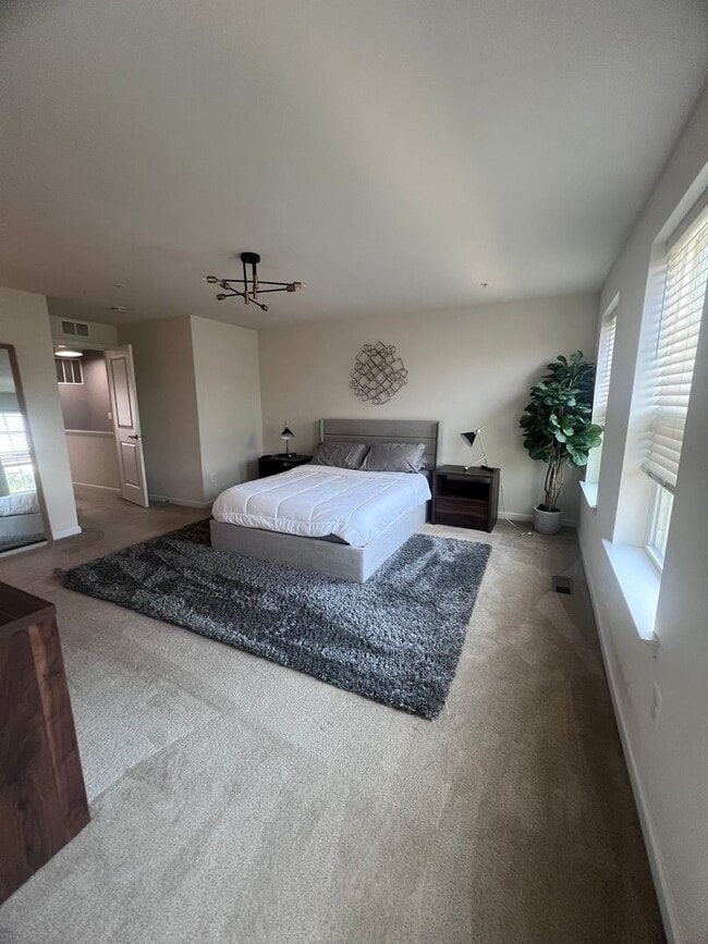 Building Photo - Bright 2BR / 2BA with One-Car Garage, Open...