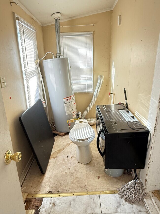 W/D room with Hot Water Heater - 400 Farrar St