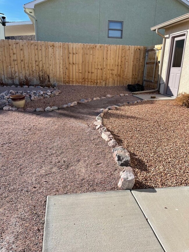 Building Photo - 3 Bedroom 2 Bath With a 2 car garage