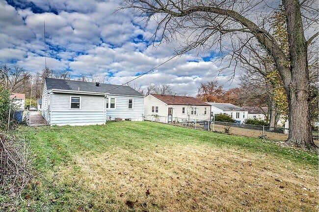 Building Photo - 3-Bedroom Home with Hardwood Floors & Fenced Yard in St. Louis