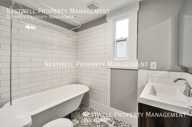 Building Photo - $500 OFF 1st MONTH! Charming Main-level Du...