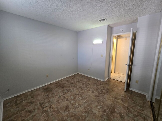 Building Photo - A Fabulous 2 Bed, 2 Bath, 1 Car Attached G...