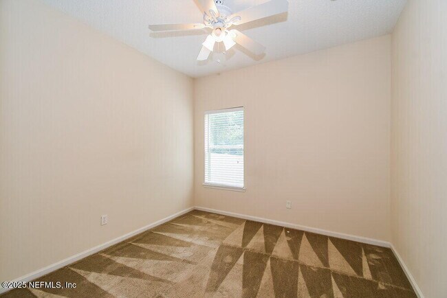 Building Photo - 7068 Rapid River Dr W