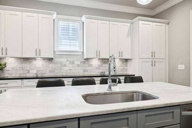 Building Photo - Welcome to this beautifully designed 4-bed...