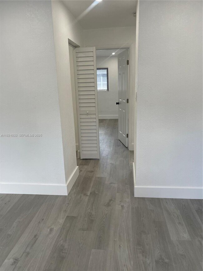 Building Photo - 880 NW 8th Ave