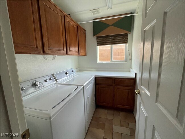 Building Photo - 8216 Romantic Sunset St