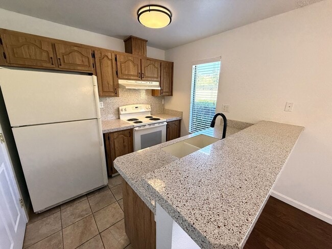 Building Photo - TWO BEDROOM /ONE BATH CONDO, ONE LEVEL GRO...