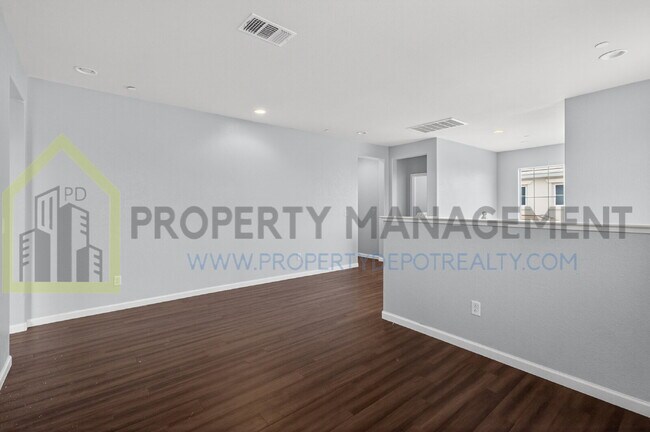 Building Photo - Spacious Elegance Awaits: 4-Bedroom Home with Hardwood Floors in Elk Grove!