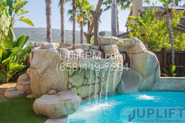 Building Photo - Spacious 5-Bedroom Home with Pool & Spa in...