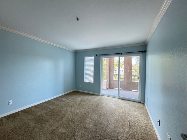 Building Photo - Magnificent 1 Bedroom Condo in Triana in Corona Ranch