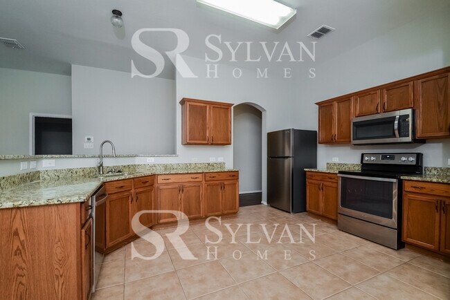 Building Photo - Lease today! No extra charge for contentment and relaxation!