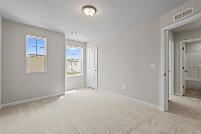 Building Photo - Be the 1st to live in this stunning, never...