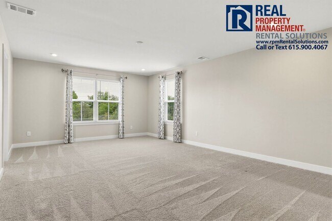 Building Photo - Great 4 bd 2.5 ba with attached garage and large deck!