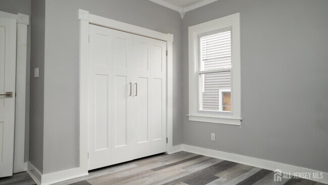 Building Photo - 65-65 Poe Ave