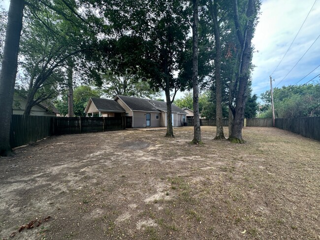 Building Photo - MOVE-IN READY! 3BR/2BA in Quiet Cove | Brick Fireplace | Fenced Yard & Patio!
