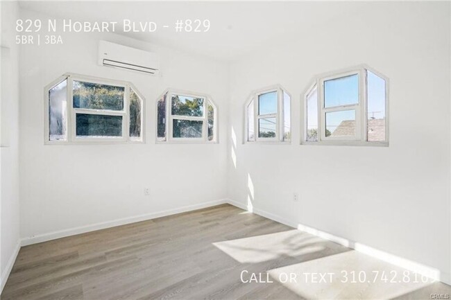 Building Photo - Luxe Living at 825 N. Hobart Blvd. – Where...