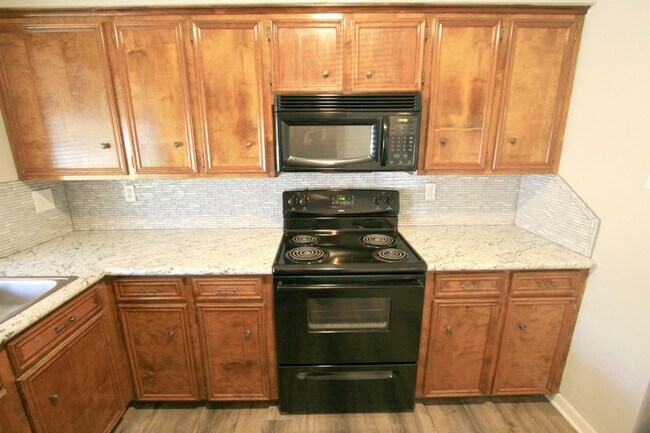 Building Photo - Spacious and Centrally Located