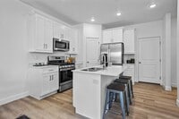 Building Photo - Lagoon Living! 3 Bedroom Townhome with Res...