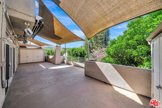 Building Photo - 4477 Woodman Ave