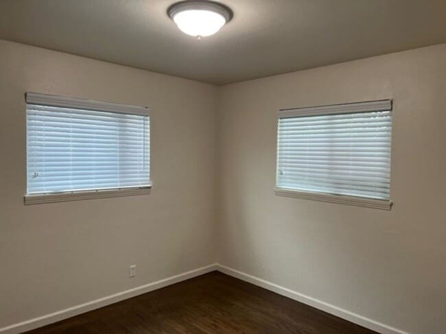 Building Photo - Central heat and air. Real hardwood floors.