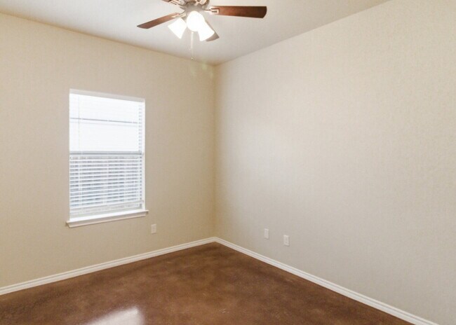 Building Photo - 3 Bedroom Duplex with Stained Concrete Floors and Greenbelt Views!