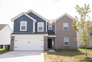 Building Photo - "Spacious 4-Bedroom Gem with 3 Full Baths ...
