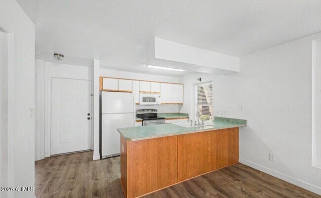 Building Photo - 7040 W Olive Ave
