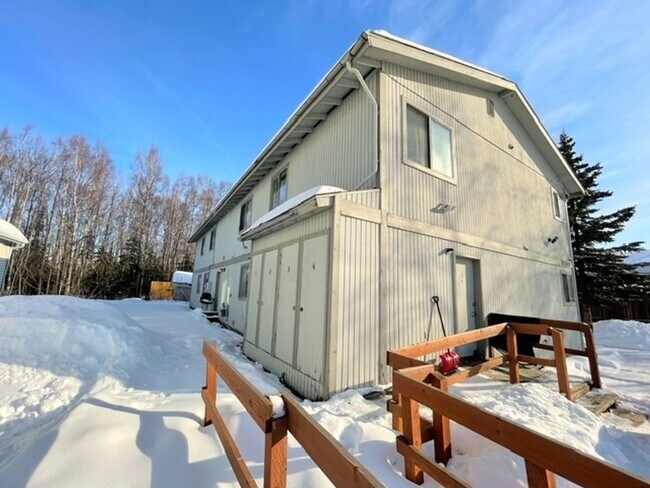 Building Photo - RARE FIND! Spacious and bright three bedroom apartment in South Anchorage with in unit laundry, f...