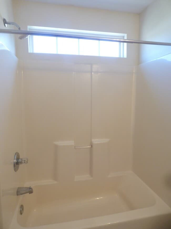 Building Photo - COMING SOON! Spacious Townhouse, W/D Hookups, Off-Street Parking, All Electric!