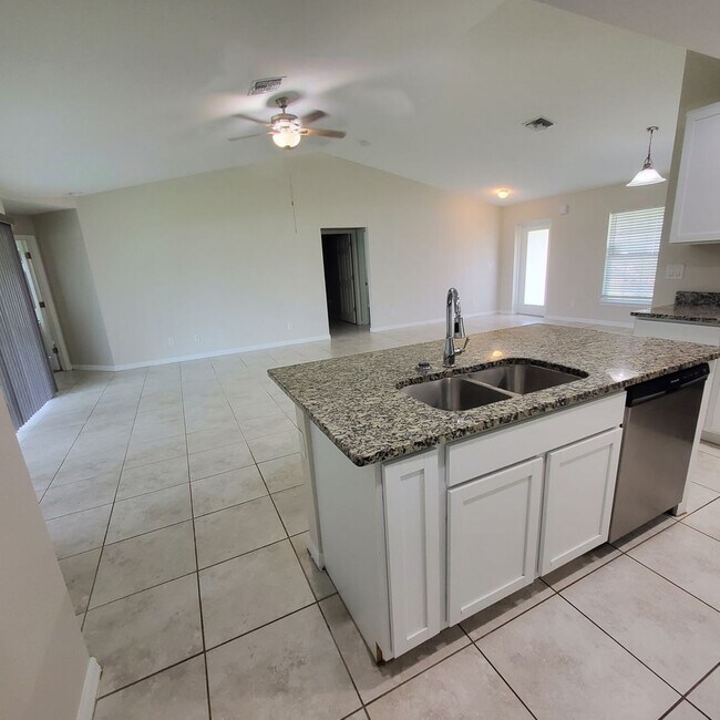 Building Photo - Coming Soon! 4 Bedroom 2 Bath Annual Rental in NW Cape!